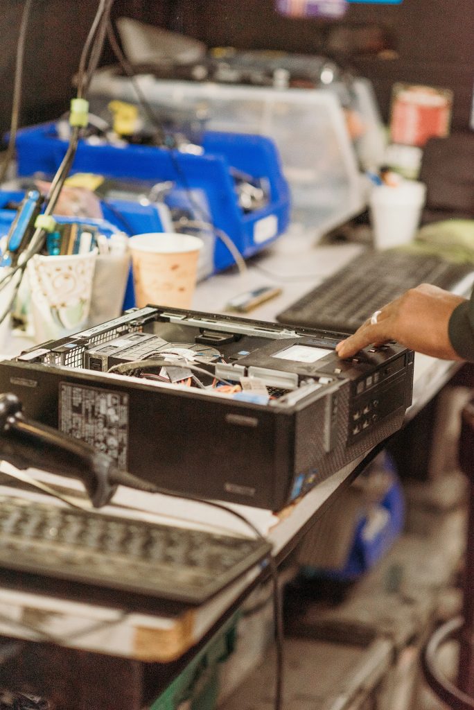 An old computer ready for recycling to help reduce electronic waste.